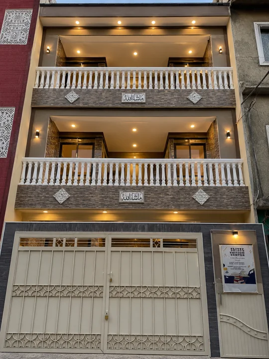 Modern urban facade with architectural details — Current Facility